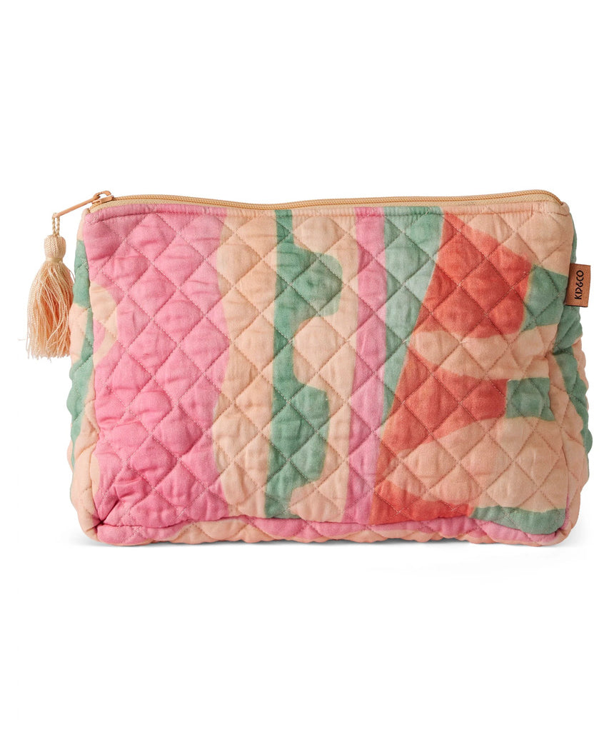 Kip & Co Sun Soaked quilted cotton toiletry purse with vibrant sun-themed pattern and zipper closure, perfect for travel accessories.