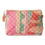 Kip & Co Sun Soaked quilted cotton toiletry purse with vibrant sun-themed pattern and zipper closure, perfect for travel accessories.
