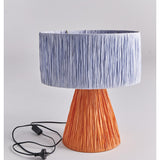 Kip & Co Tangier Raffia Table Lamp with woven raffia shade and natural wooden base, perfect for stylish home decor.