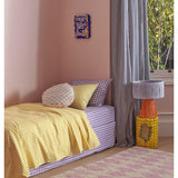 Kip & Co Tangier Raffia Table Lamp with woven rattan base and neutral fabric shade, stylish home lighting decor.