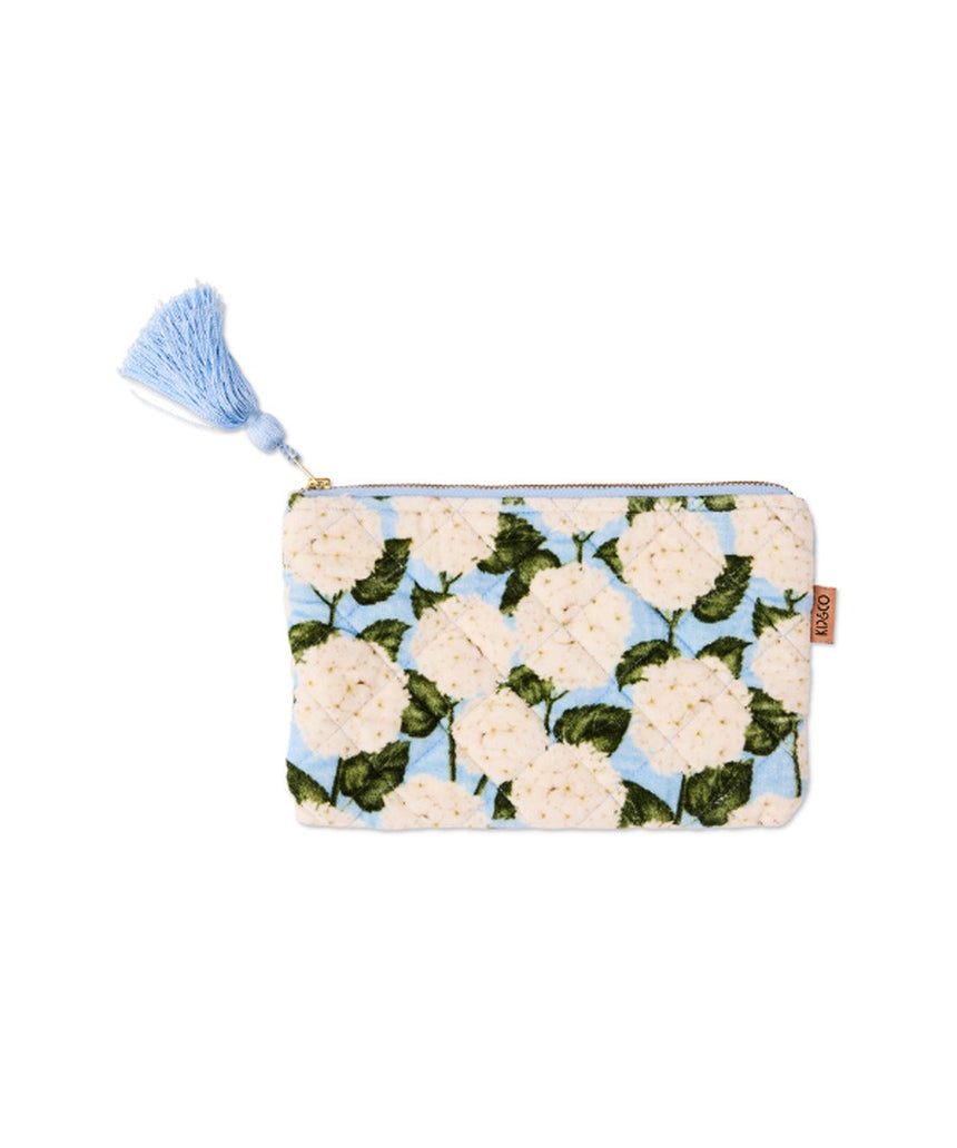 Kip&Co velvet cosmetics purse in Hydrangea Blue with a soft, textured fabric and compact design for makeup essentials.