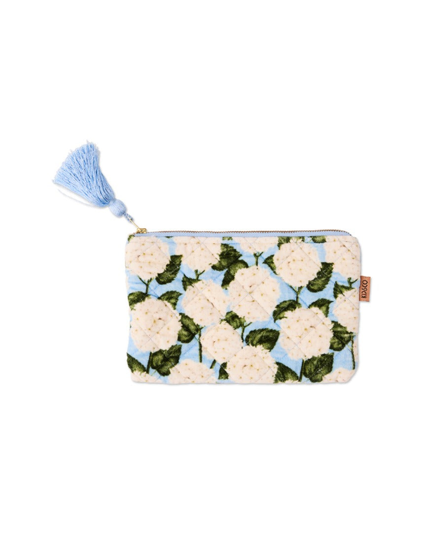 Kip&Co velvet cosmetics purse in Hydrangea Blue with a soft, textured fabric and compact design for makeup essentials.