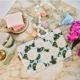 Kip&Co velvet cosmetics purse in Hydrangea Blue with a soft textured fabric and compact design for beauty essentials.