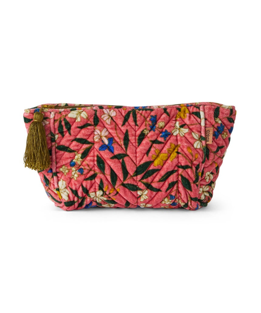 Kip&Co velvet toiletry bag in Canopy Rose with soft fabric and zipper closure, designed for travel storage of personal items.