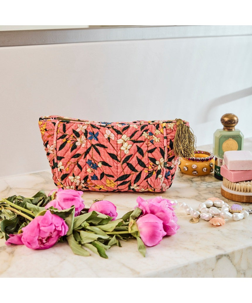 Kip&Co velvet toiletry bag in Canopy Rose with zipper closure and soft fabric, designed for travel and storage.