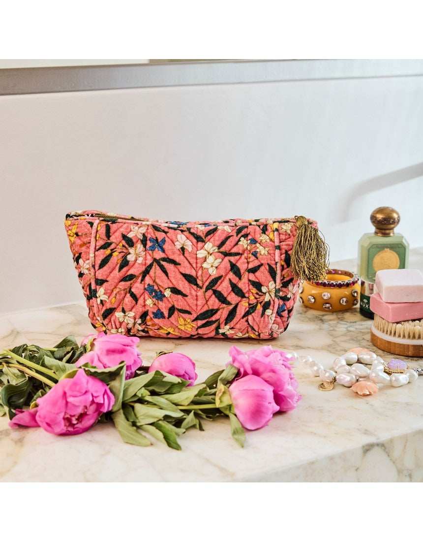 Kip&Co velvet toiletry bag in Canopy Rose with zipper closure and soft fabric, designed for travel and storage.
