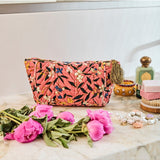 Kip&Co velvet toiletry bag in Canopy Rose with zipper closure and soft fabric, designed for travel and storage.