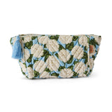 Kip&Co velvet toiletry bag in Hydrangea Blue with a soft, plush texture and floral pattern, ideal for travel organization.