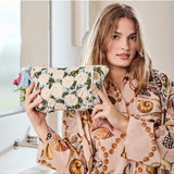 Kip&Co velvet toiletry bag in Hydrangea Blue with zipper closure and soft fabric, perfect for travel storage.