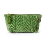 Kip&Co velvet toiletry bag in Pesto color with soft texture and zipper closure, designed for travel and storage.
