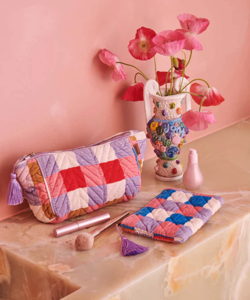 Kip & Co summer check velvet toiletry bag in vibrant check pattern, soft velvet fabric, perfect for travel accessories.