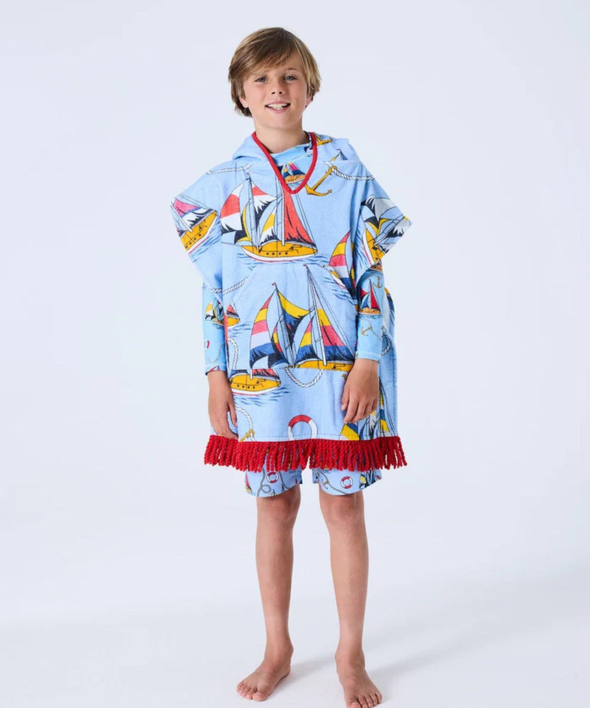 Kip&Co kids' printed terry poncho with nautical Hey Sailor design, featuring soft fabric and colorful sailor-themed pattern.