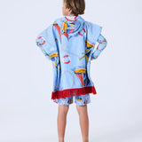 Kip&Co printed kids terry poncho featuring a nautical "Hey Sailor" design, soft fabric, and colorful pattern for children.