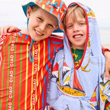 Kip&Co printed kids terry poncho with sailor-themed design, soft terry fabric, and hood for comfortable kids' wear.