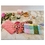 Kip&Co velvet cosmetics purse in Sorbet Tartan with a soft, plush fabric and compact design for makeup storage.