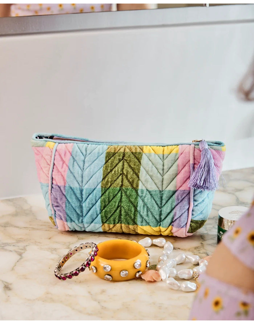 Kip&Co velvet toiletry bag in Sorbet Tartan with soft fabric and zip closure, perfect for travel organization.