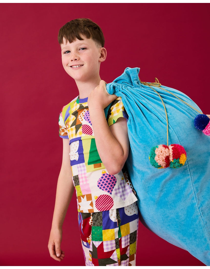 Kip & Co Blue Bells velvet Santa sack with festive floral design and drawstring closure