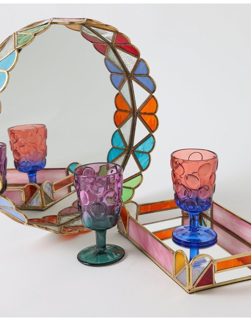 Kip & Co Bon Bon round serving tray with colorful abstract pattern and raised rim
