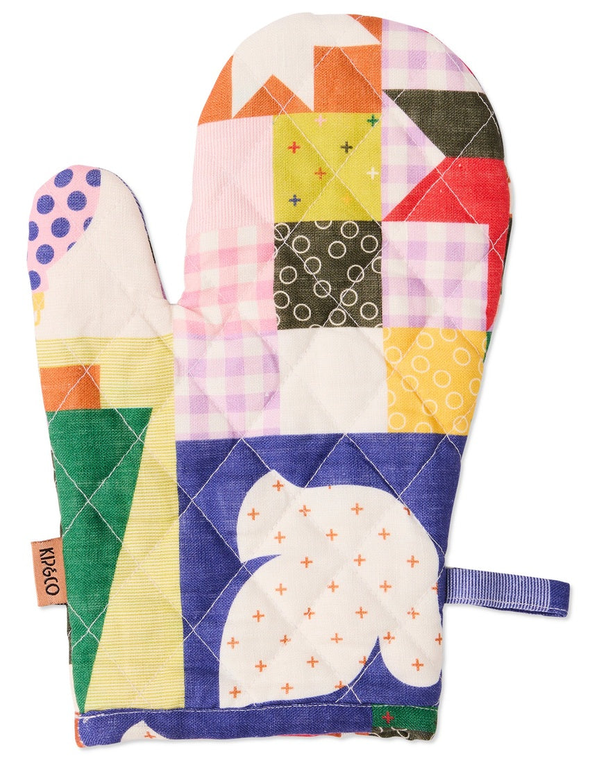 Kip & Co Christmas patchwork oven mitt in festive multicoloured fabric with quilted design
