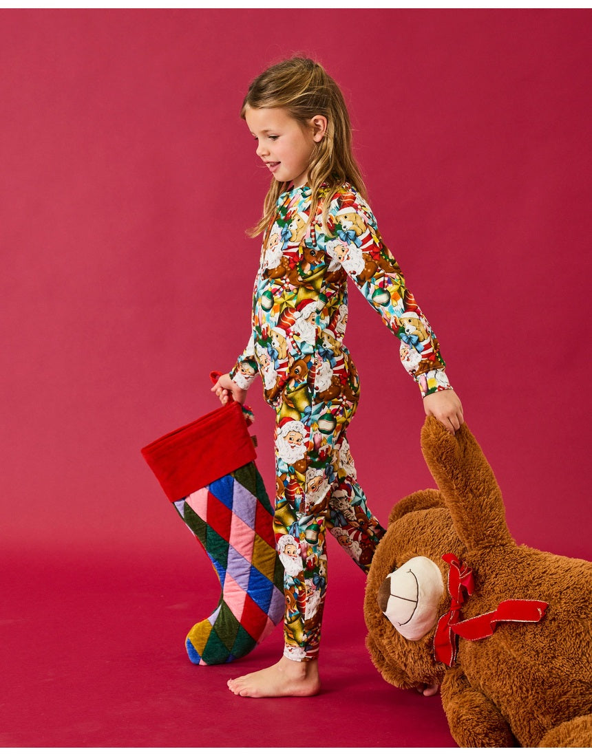 Kip & Co Jolly Christmas Harlequin velvet stocking with colorful diamond pattern and hanging loop