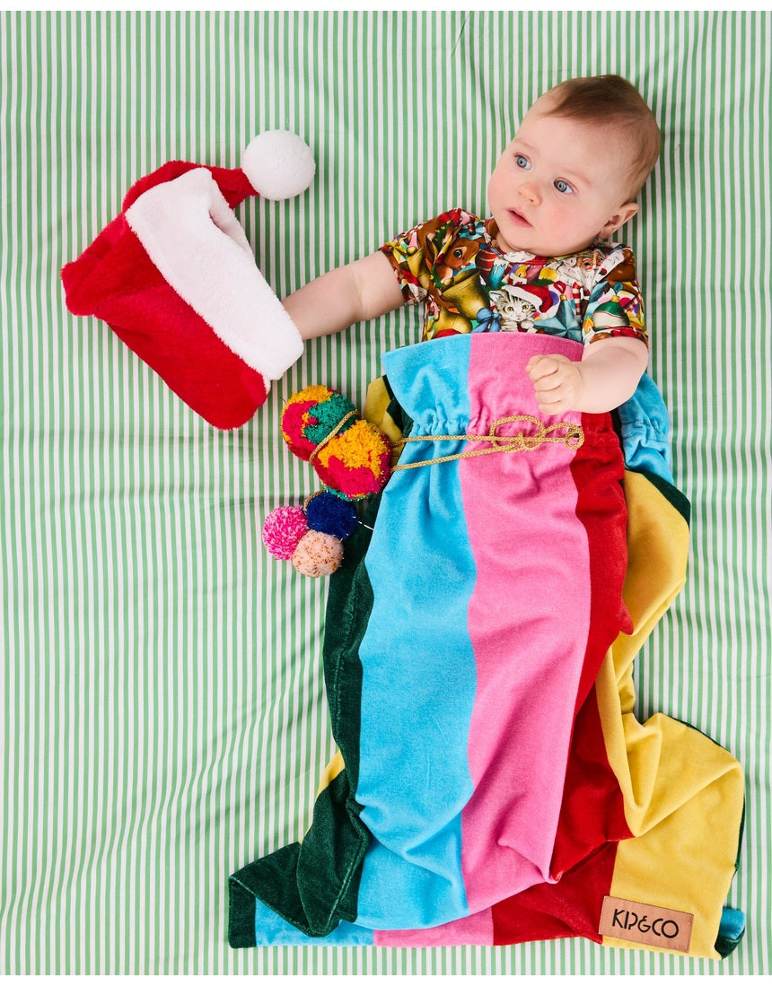 Kip & Co Rainbow Joy velvet Santa sack with colorful rainbow design for Christmas decorations
