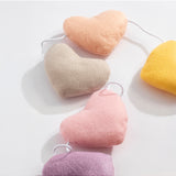 Living Textiles Felt Heart Bunting in Bohemian Bliss nursery decor, colorful felt hearts hanging as playful wall decoration