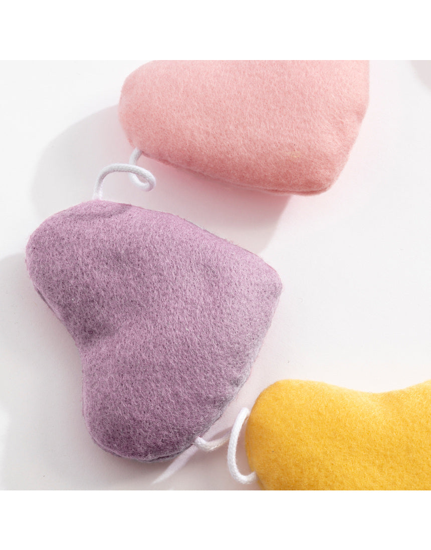 Living Textiles Felt Heart Bunting in Bohemian Bliss, soft nursery decor with colorful felt hearts hanging on a string.