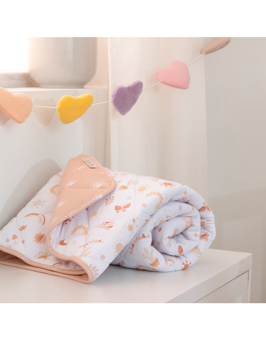Living Textiles Felt Heart Bunting in Bohemian Bliss nursery decor, featuring colorful felt hearts hanging on a string.