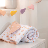 Living Textiles Felt Heart Bunting in Bohemian Bliss nursery decor, featuring colorful felt hearts hanging on a string.
