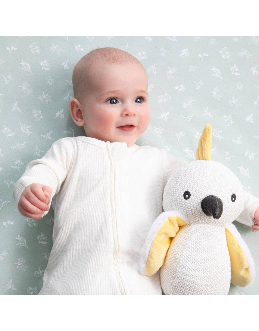 Living Textiles knitted toy Colin the Cockatoo, soft plush bird with detailed feathers, perfect for cuddling.