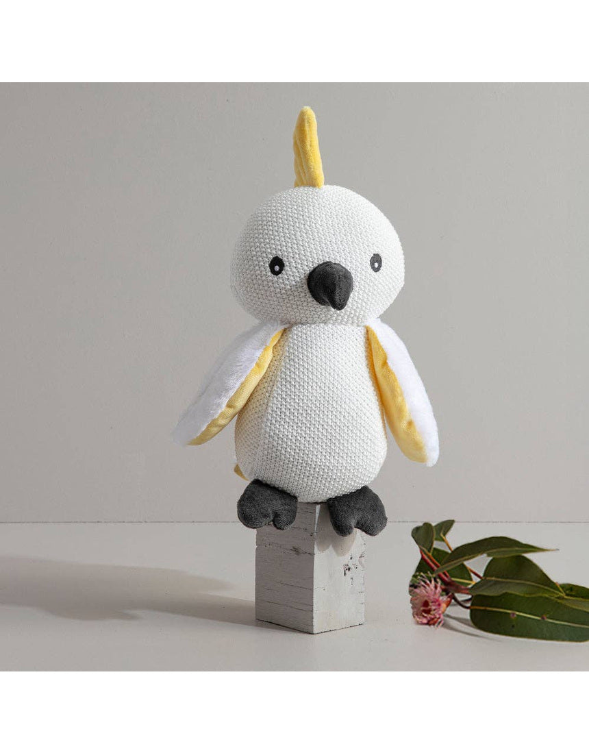 Living Textiles knitted toy Colin the Cockatoo, a soft and cuddly bird-shaped plush toy with detailed features.