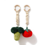 Living Textiles mini market stroller toys featuring plush broccoli and tomato, perfect for pram and stroller entertainment.