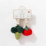 Living Textiles mini market stroller toys featuring colorful broccoli and tomato plush toys for infants and toddlers.