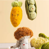 Living Textiles mini market stroller toys featuring a colorful carrot and green peas for baby pram entertainment.