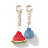 Living Textiles mini market stroller toys featuring colorful watermelon and blueberry plush toys for infants.