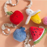 Living Textiles mini market stroller toys featuring a watermelon and blueberry design for pram and stroller decor.