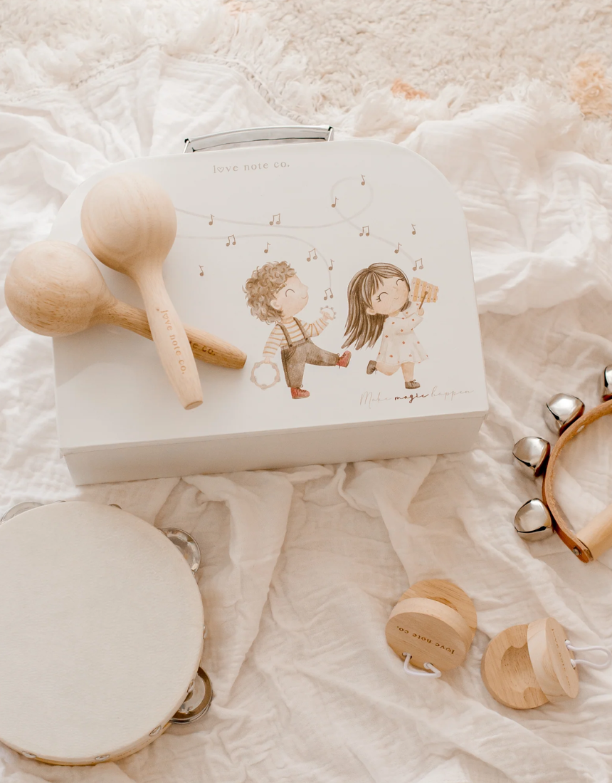 Love Note Co Little Love Music Set, colorful musical toy with heart-shaped design and musical buttons for children.