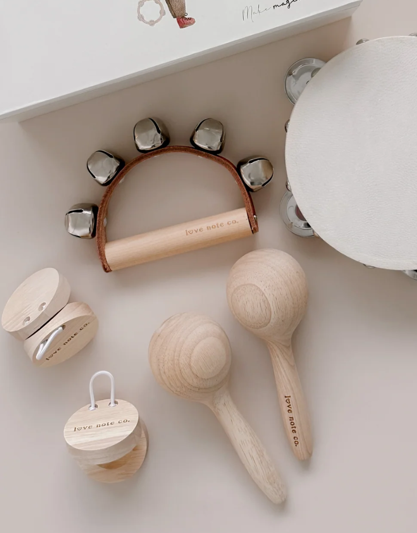 Love Note Co musical toy set featuring a small love-themed music box and playful design for children.