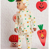 Halcyon Nights baby bib with Teeny Tiny Veg print, featuring colorful vegetable illustrations and a soft fabric for infants.