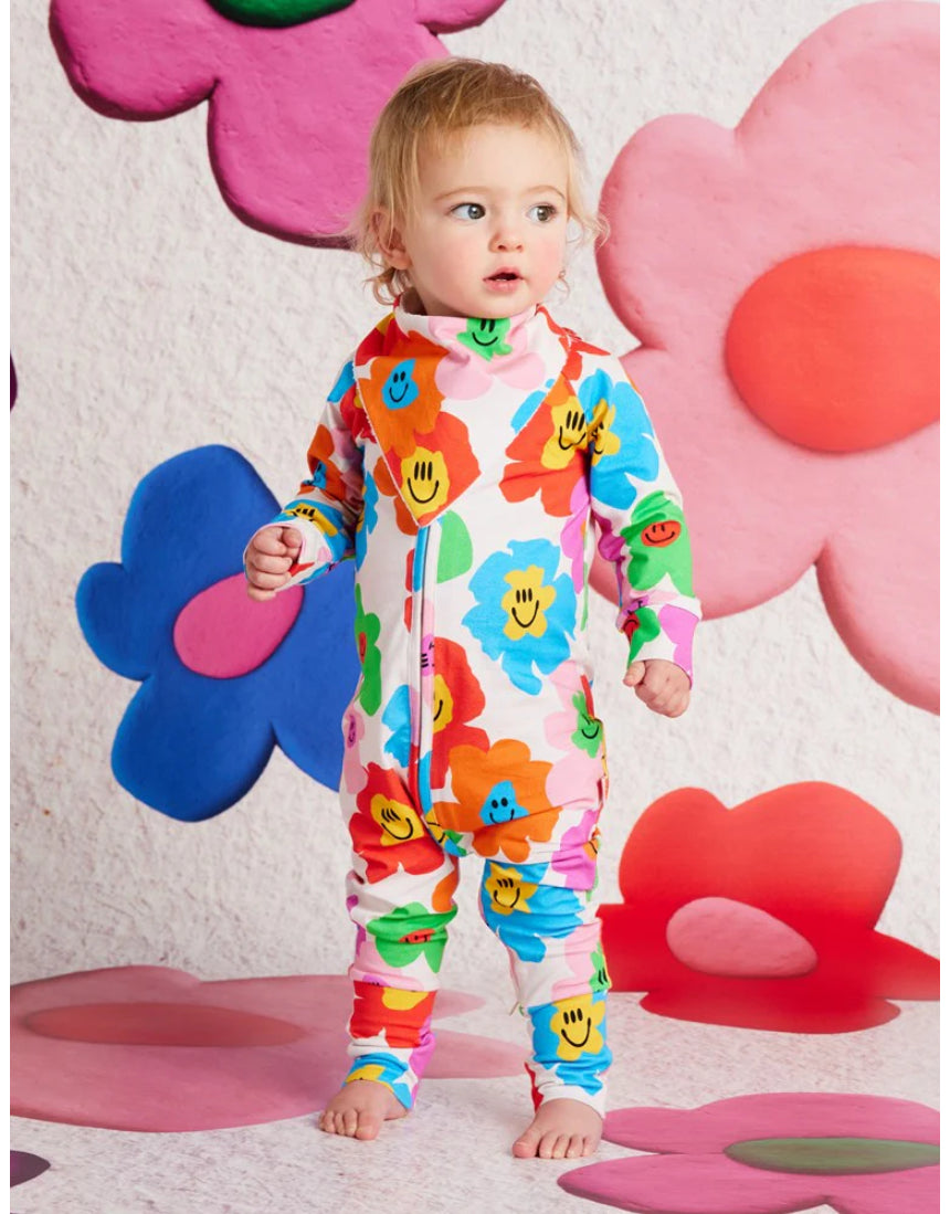 Halcyon Nights Hej Blomma! bib featuring colorful floral design for babies and toddlers.