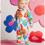 Halcyon Nights Hej Blomma! bib featuring colorful floral design for babies and toddlers.