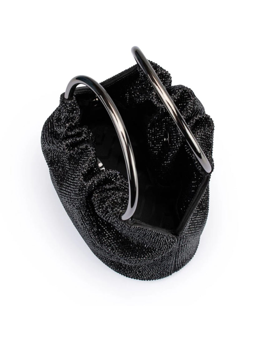Olga Berg Mabel black crystal top handle bag with elegant design and shiny crystal accents on the handle.