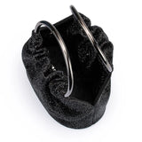 Olga Berg Mabel black crystal top handle bag with elegant design and shiny crystal accents on the handle.