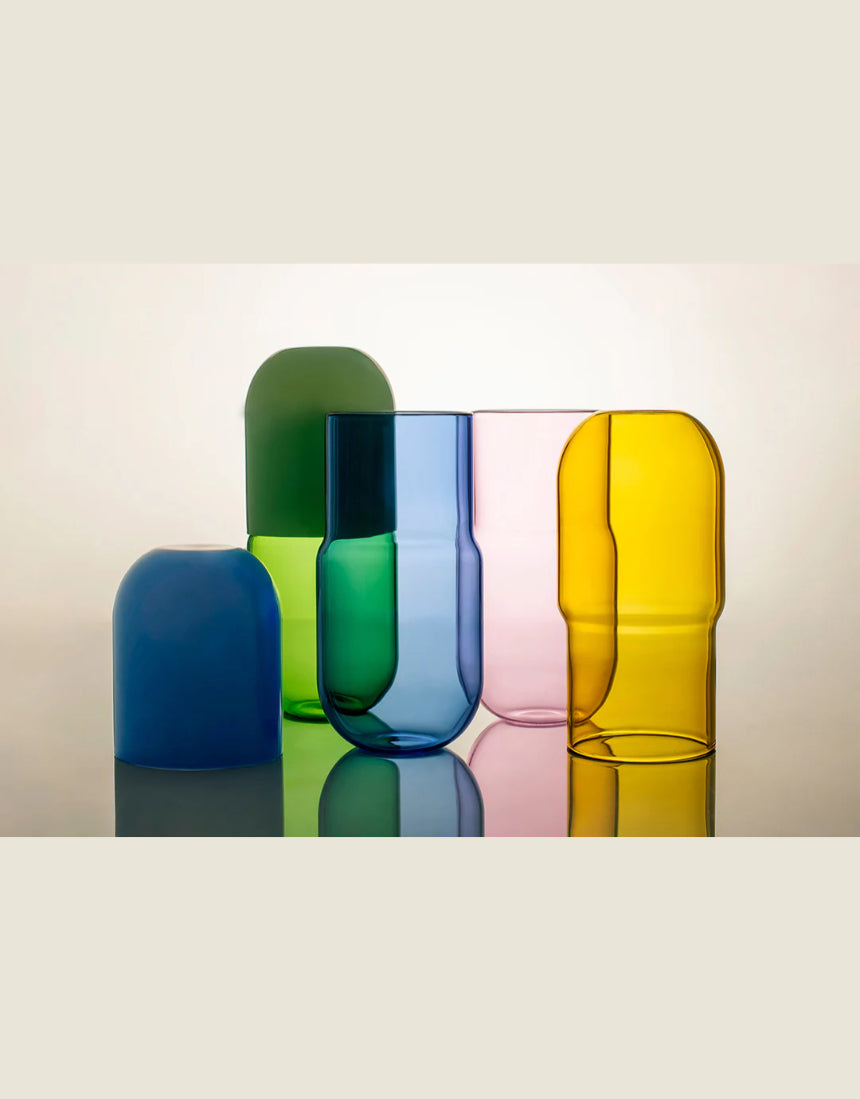 Maho Happi Pill Fairy Floss glassware featuring colorful, playful designs with the product name visible on the pill-shaped glass.