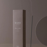 Maho artisan leather incense sticks in a decorative box, showcasing artisanal craftsmanship and natural leather scent.