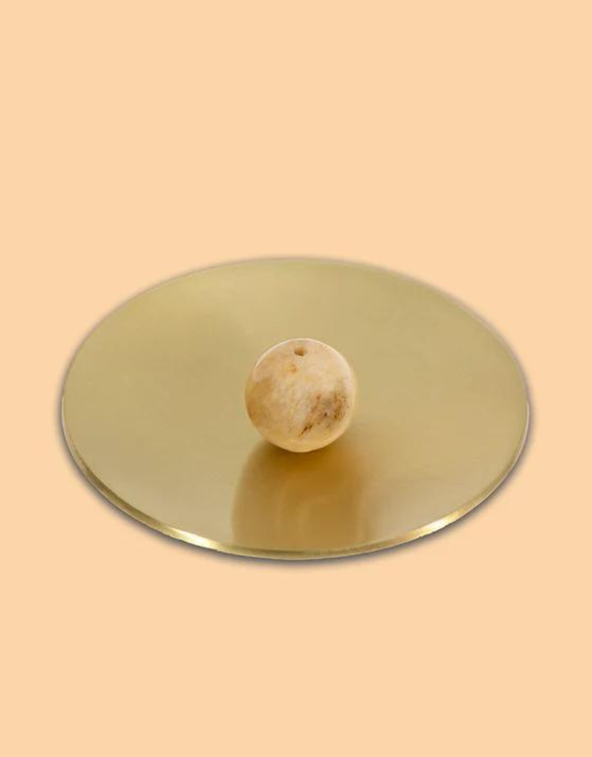 Yellow jade incense burner holder with intricate design, crafted by Maho, featuring the Hoseki Mari motif and smooth, polished surface.