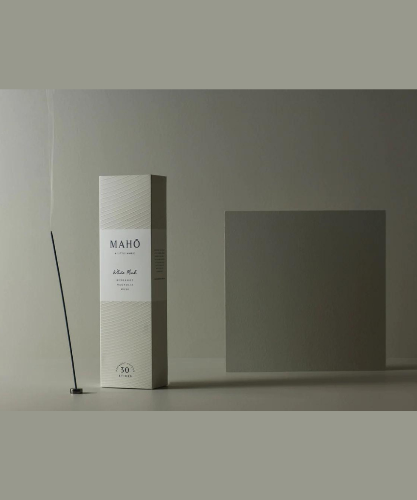 Maho White Musk Incense sticks in a box, with white packaging and scent description visible, designed for aromatic burning.