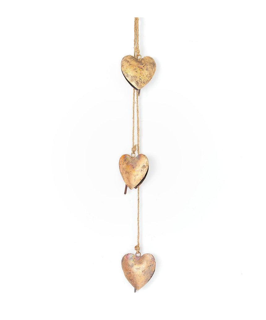 Matr Boomie Alaya Heart Trio Wind Chime with three heart-shaped metal tubes hanging from a decorative top.