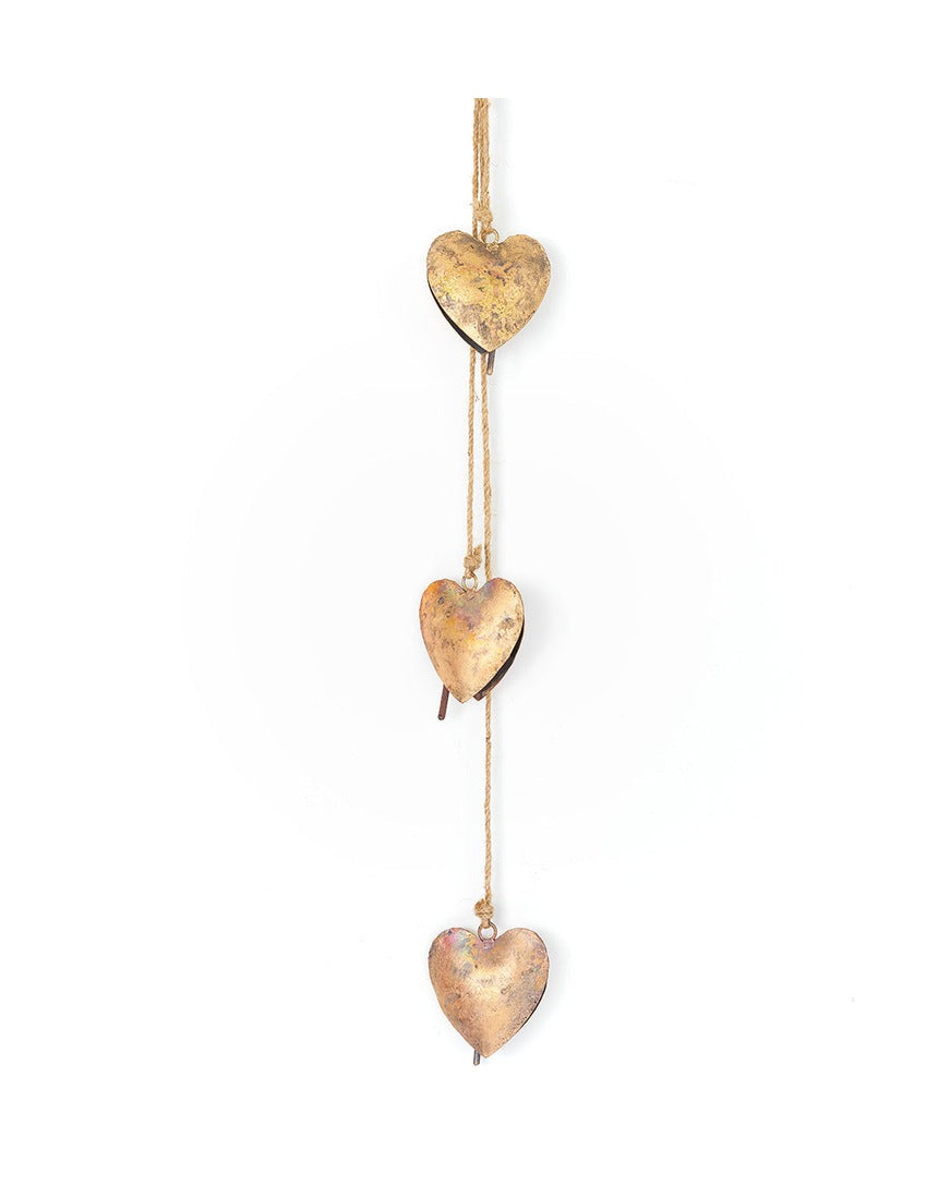 Matr Boomie Alaya Heart Trio Wind Chime with three heart-shaped metal tubes hanging from a decorative top.