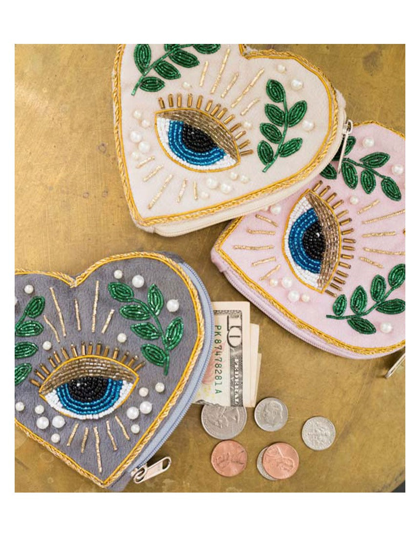 Colorful Matr Boomie Manku beaded heart coin purse with intricate beadwork and compact design, perfect for storing small essentials.